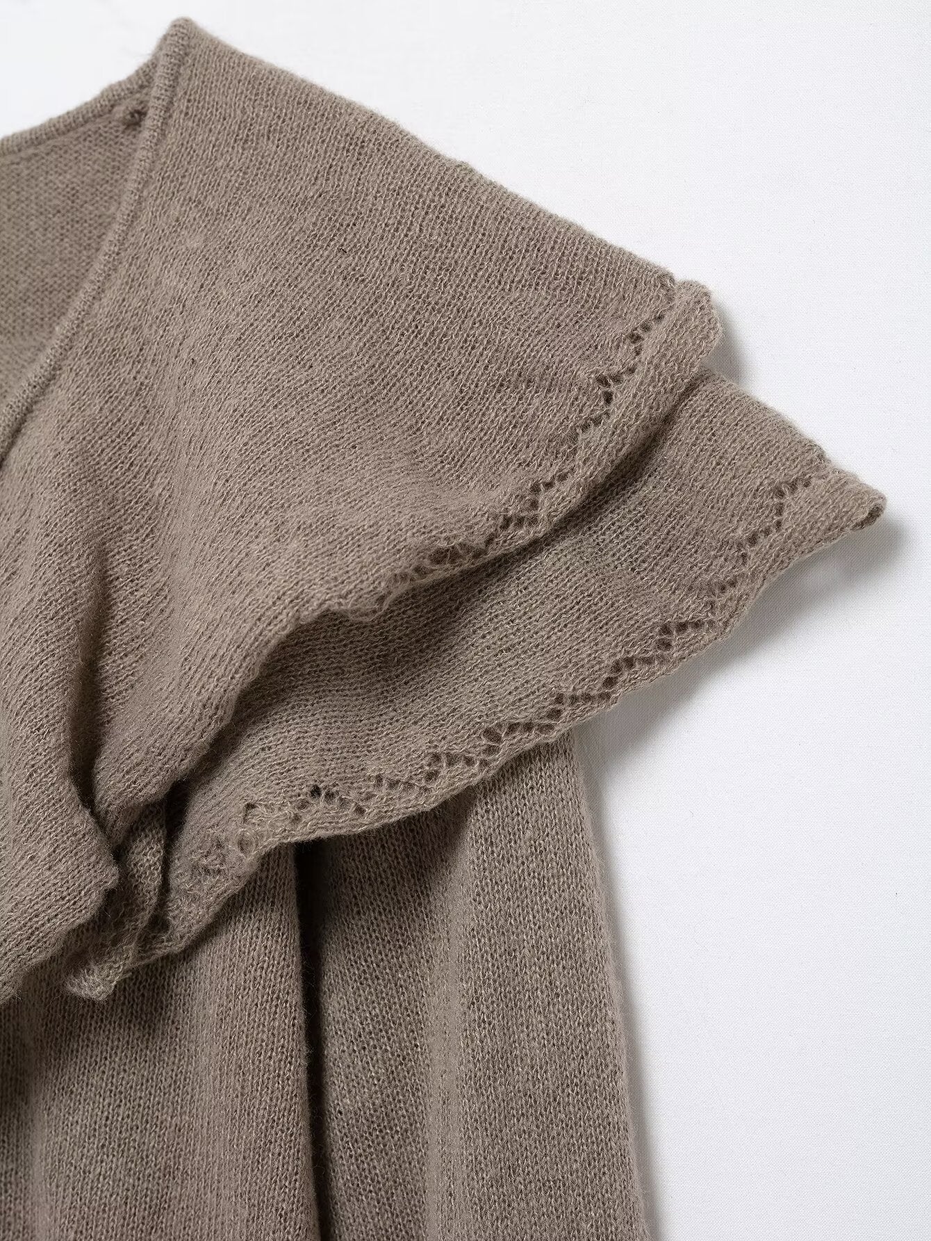 Suéter punto volantes