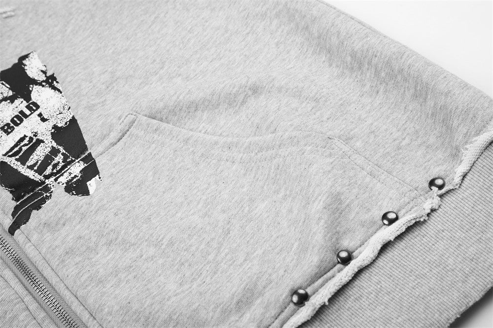 SUDADERA GRÁFICA TACHAS CREMALLERA