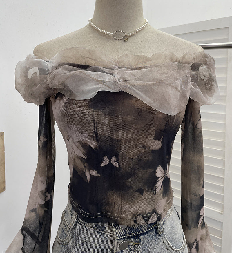 Camiseta off-shoulder muselina