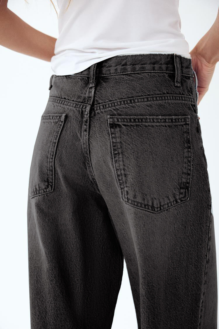 JEANS TIRO-ALTO ASIMÉTRICO