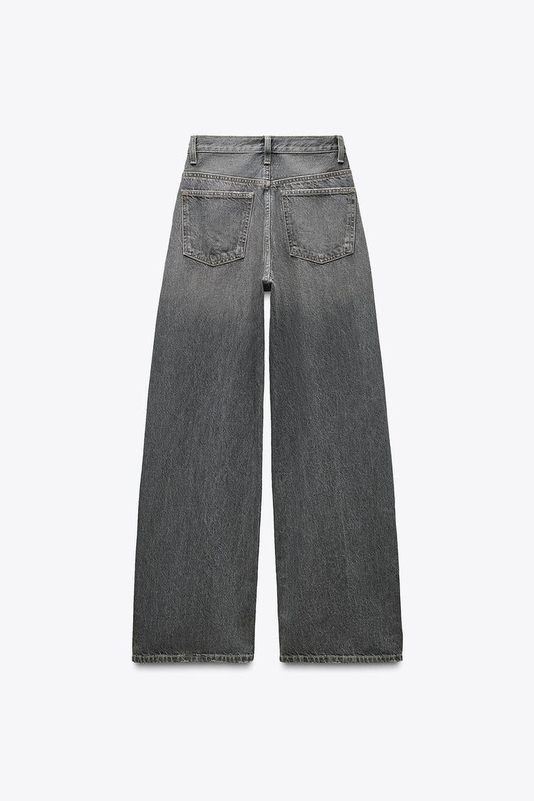 JEANS TIRO-ALTO ASIMÉTRICO