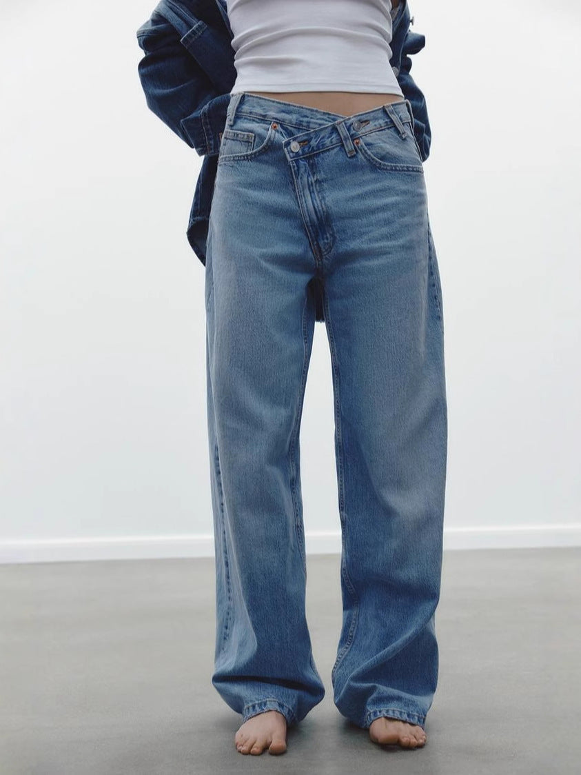JEANS TIRO-ALTO ASIMÉTRICO