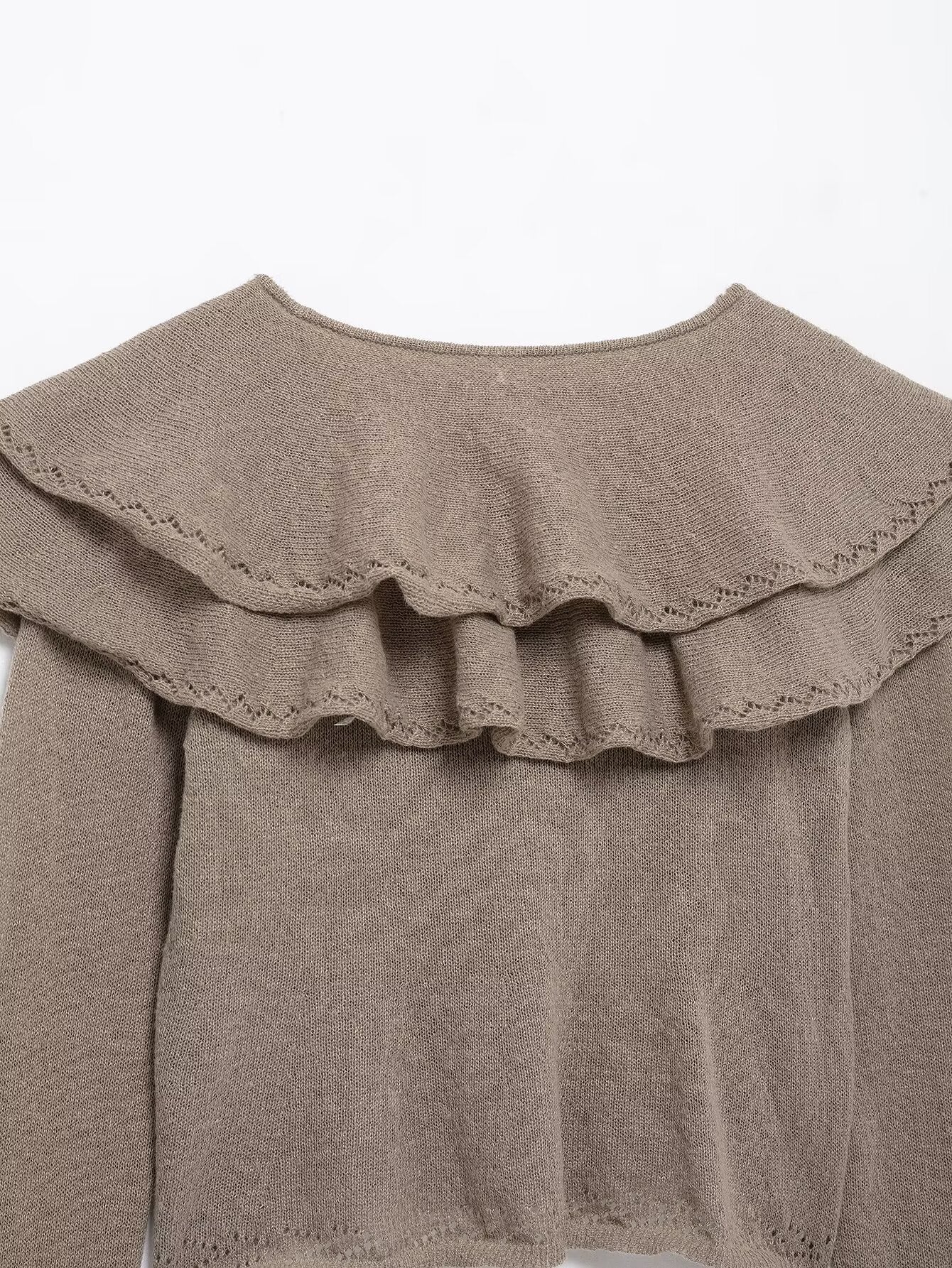 Suéter punto volantes