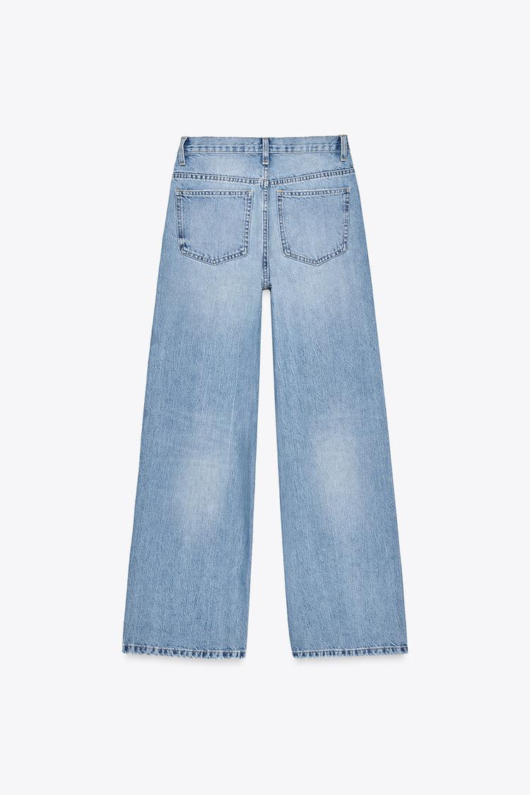 JEANS TIRO-ALTO ASIMÉTRICO