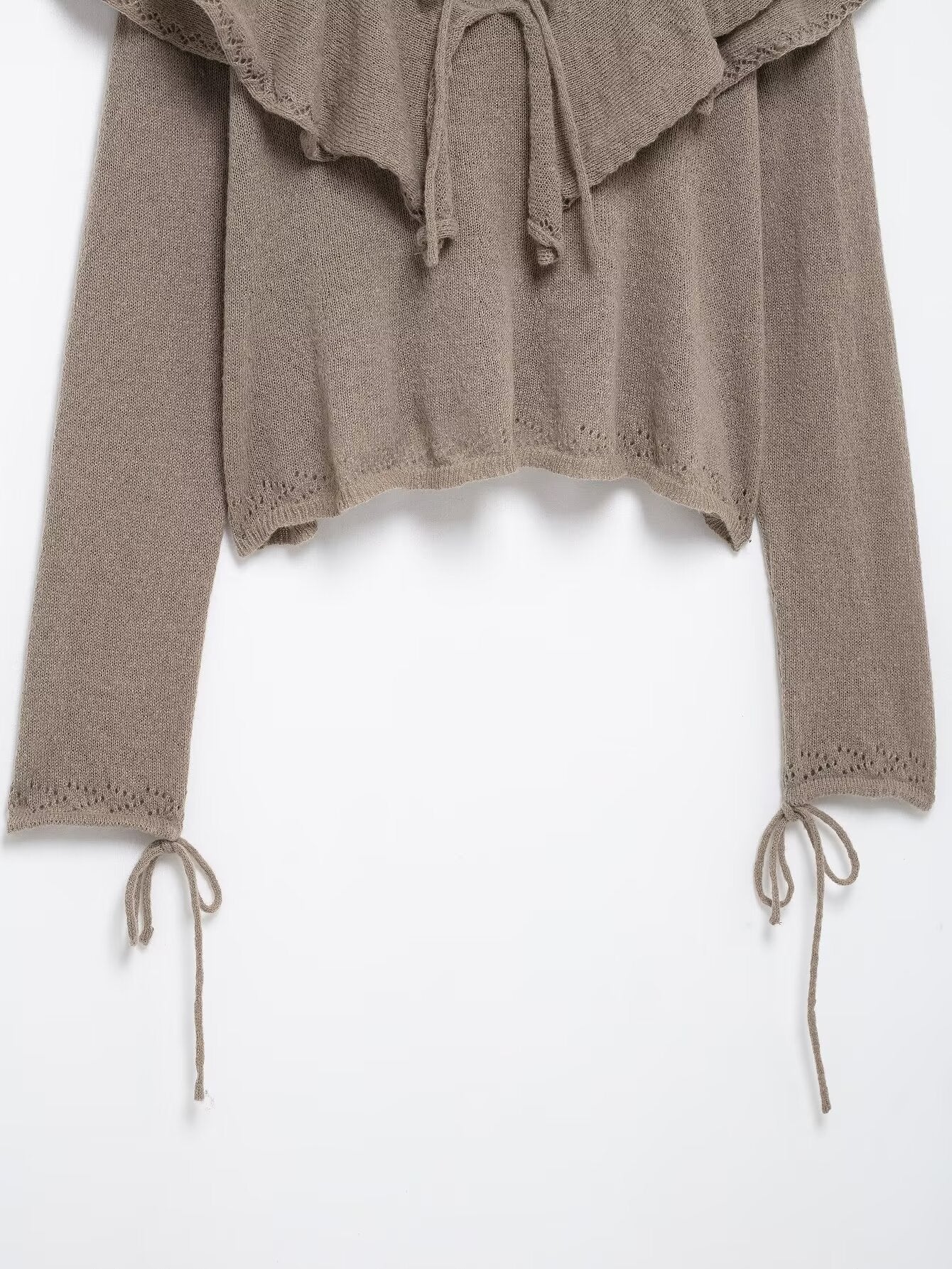 Suéter punto volantes