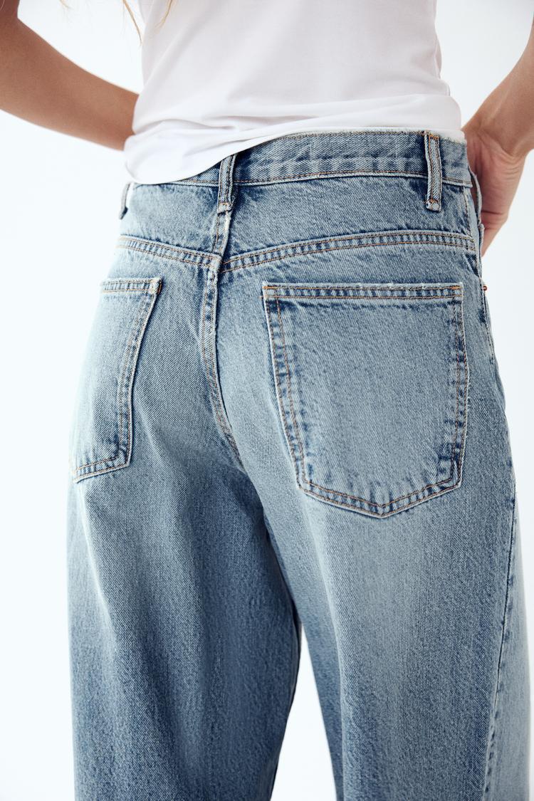 JEANS TIRO-ALTO ASIMÉTRICO