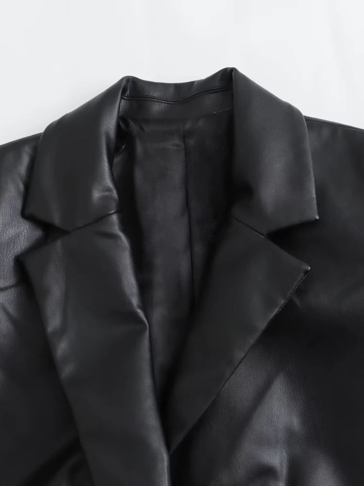 Gabardina cuero sintético