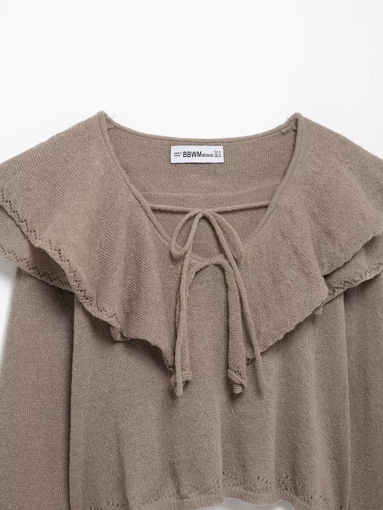 Suéter punto volantes