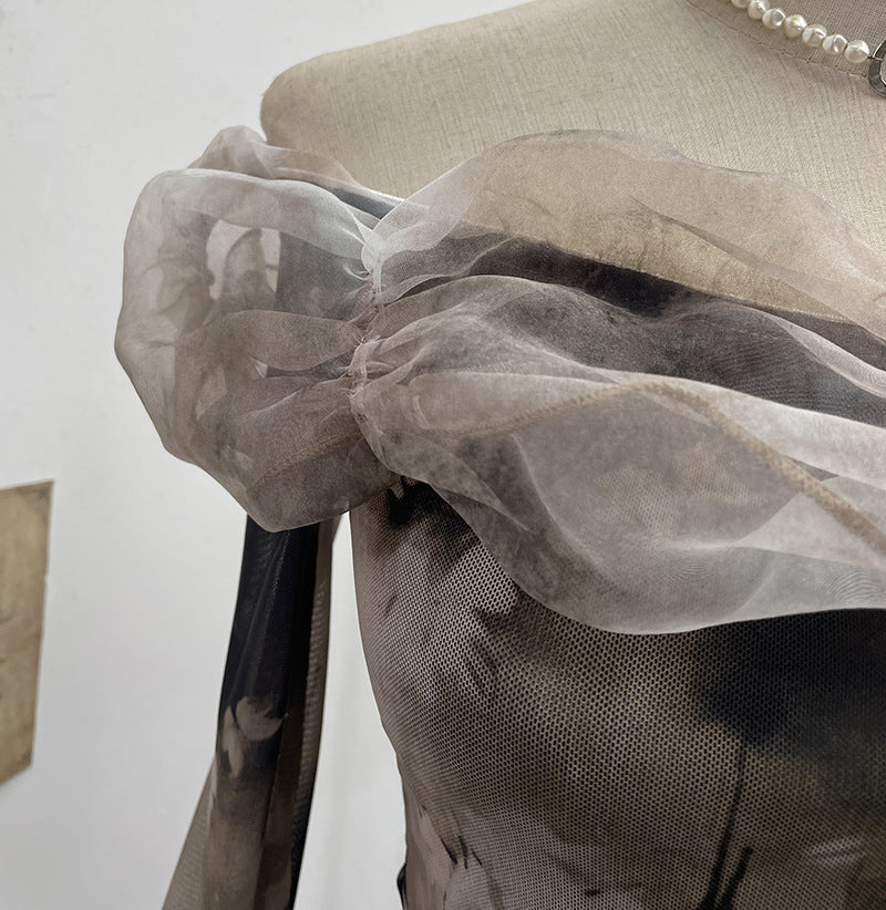 Camiseta off-shoulder muselina