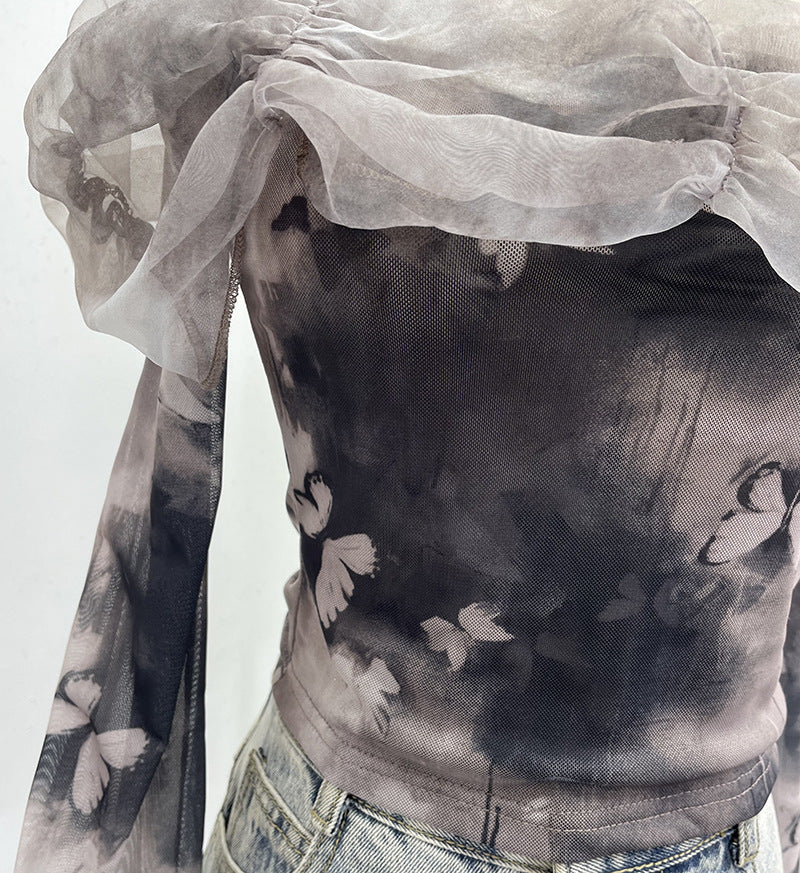 Camiseta off-shoulder muselina