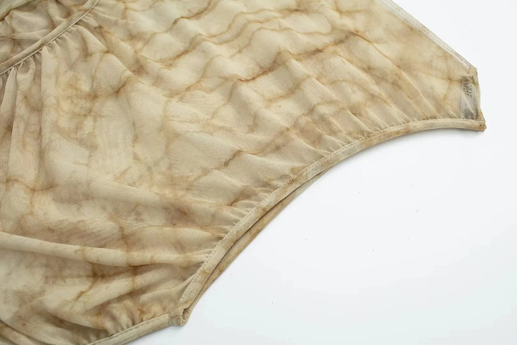 Camiseta manga asimétrica