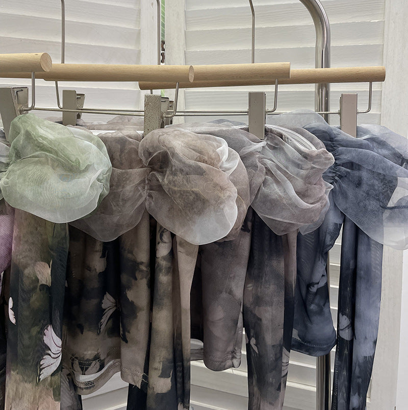 Camiseta off-shoulder muselina