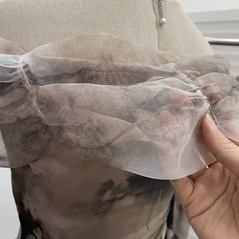 Camiseta off-shoulder muselina