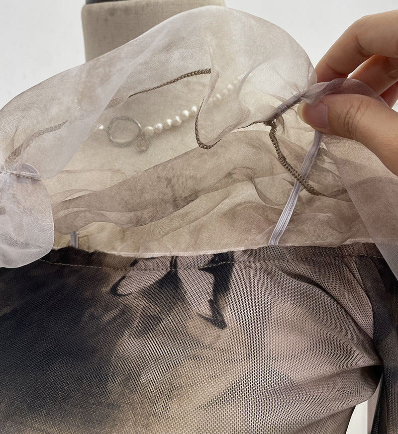 Camiseta off-shoulder muselina