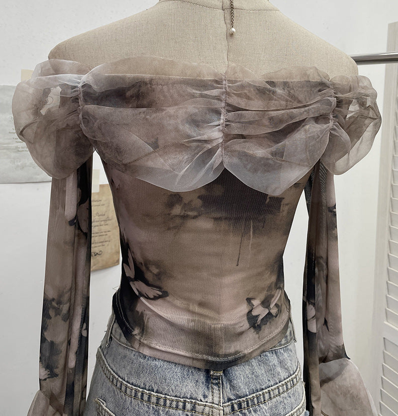 Camiseta off-shoulder muselina